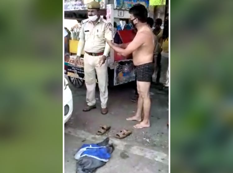 हेलमेट न होने पर चालान, शख्स ने भीड़ के सामने उतारे कपड़े