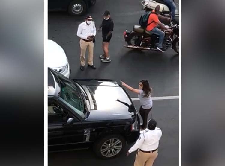 दूसरी महिला के साथ कार में था पति, बोनट पर चढ़ पत्नी ने किया हंगामा