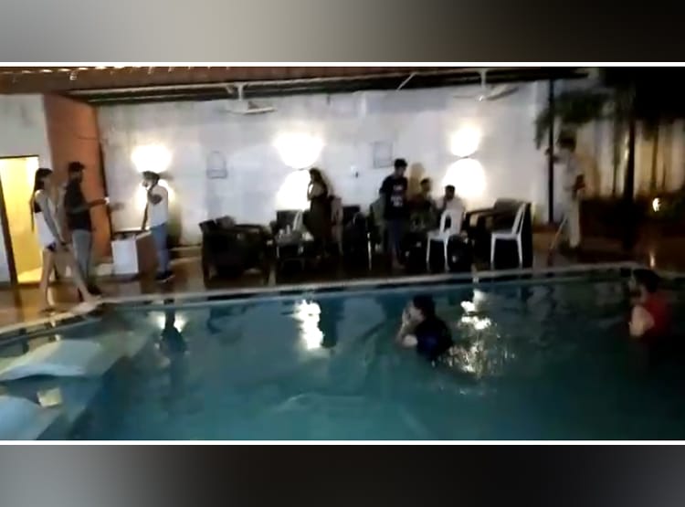 कर्फ्यू में चल रही थी पूल पार्टी, नशे में लड़की पुलिस से करने लगी बहस