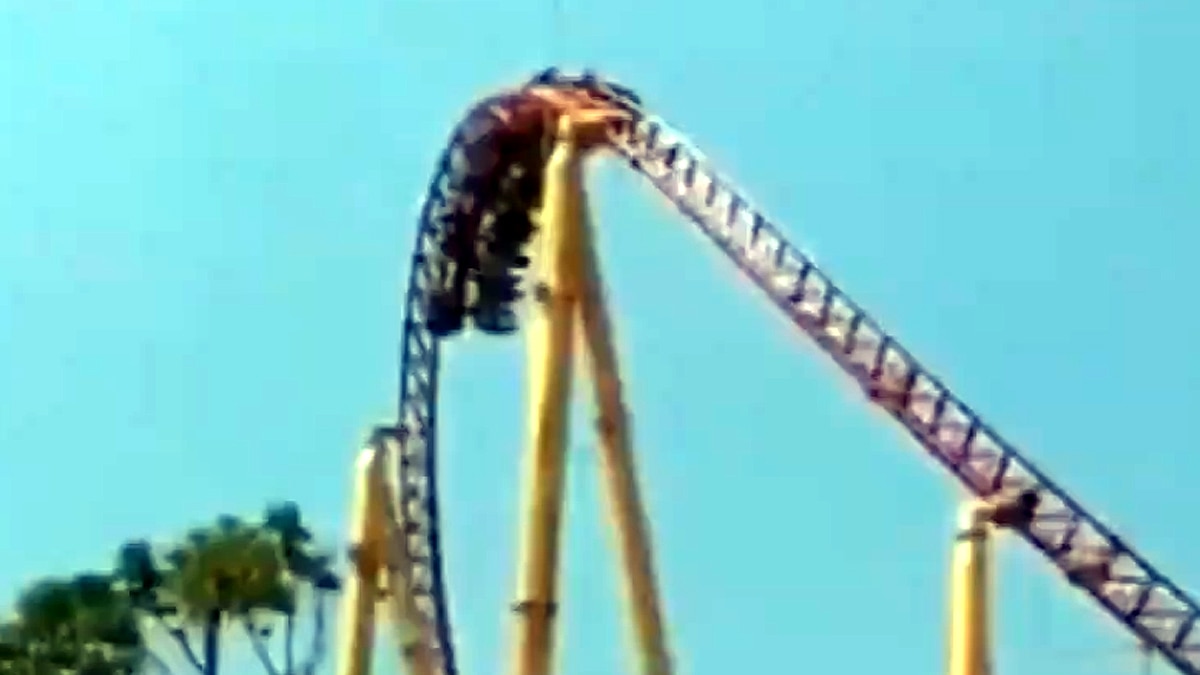  China People hanging upside down on rollercoaster