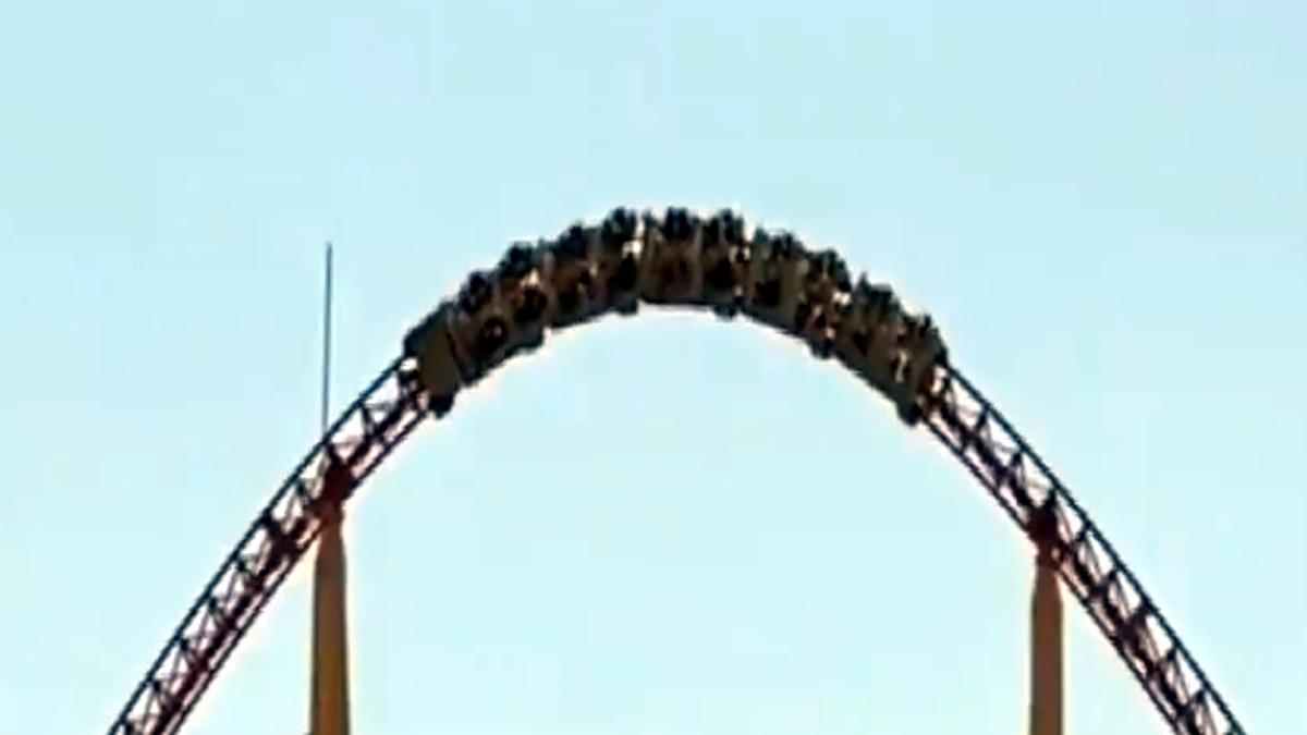 China People hanging upside down on rollercoaster