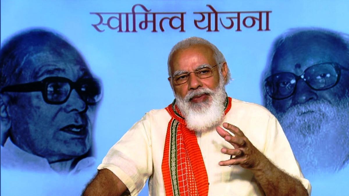 पीएम मोदी ने वितरित किये प्रॉपर्टी कार्ड 