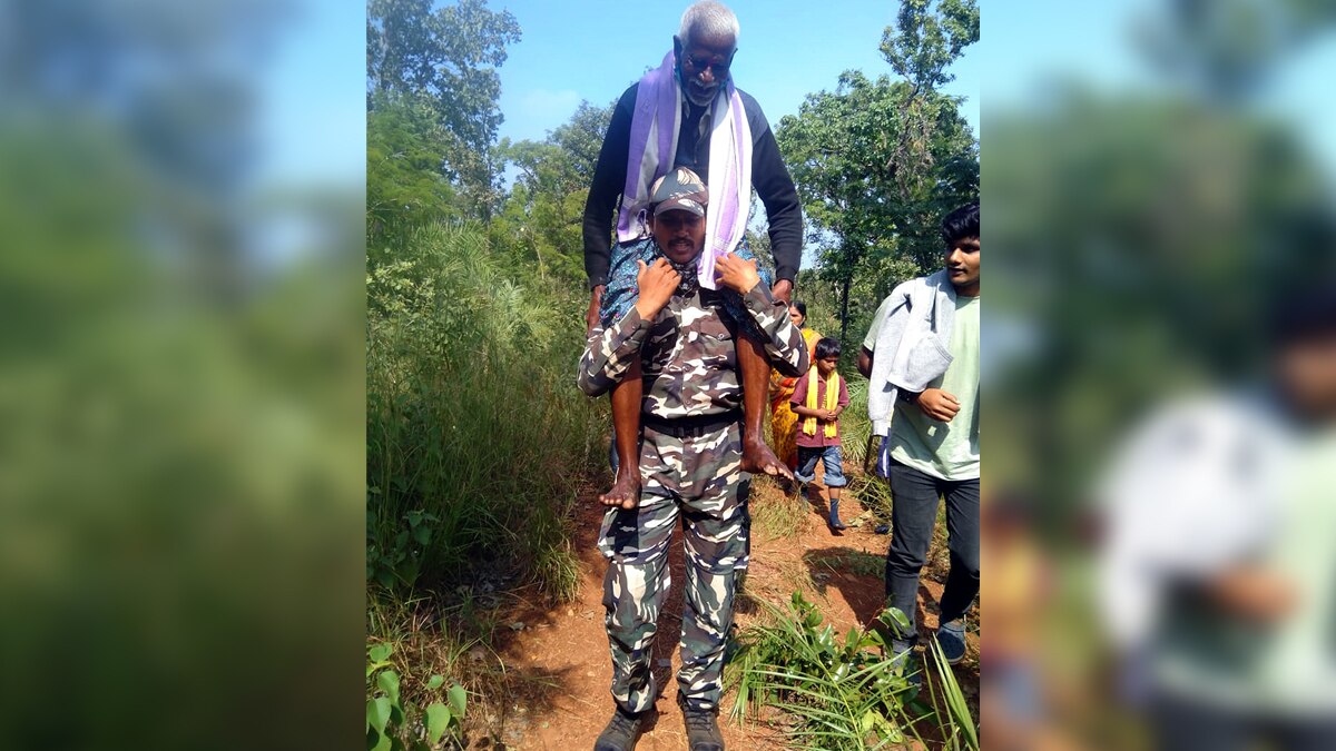 Muslim Constable Carry Hindu Woman on Shoulder
