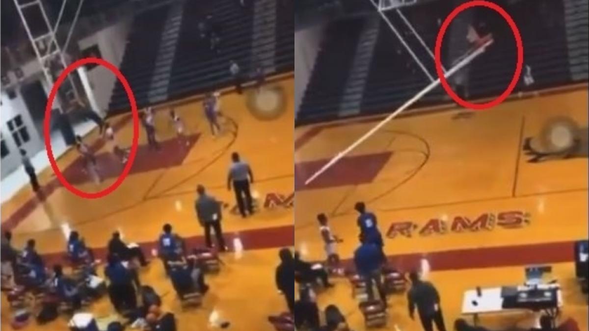 नेट से लटका खिलाड़ी