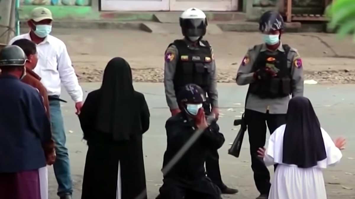Myanmar Nun Kneels said Spare the kids Kill me