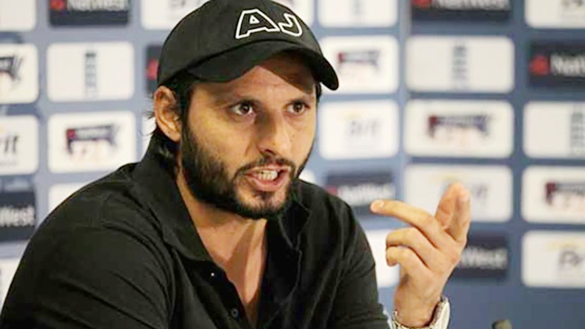 Eoin Morgan wearing two caps in T20 series