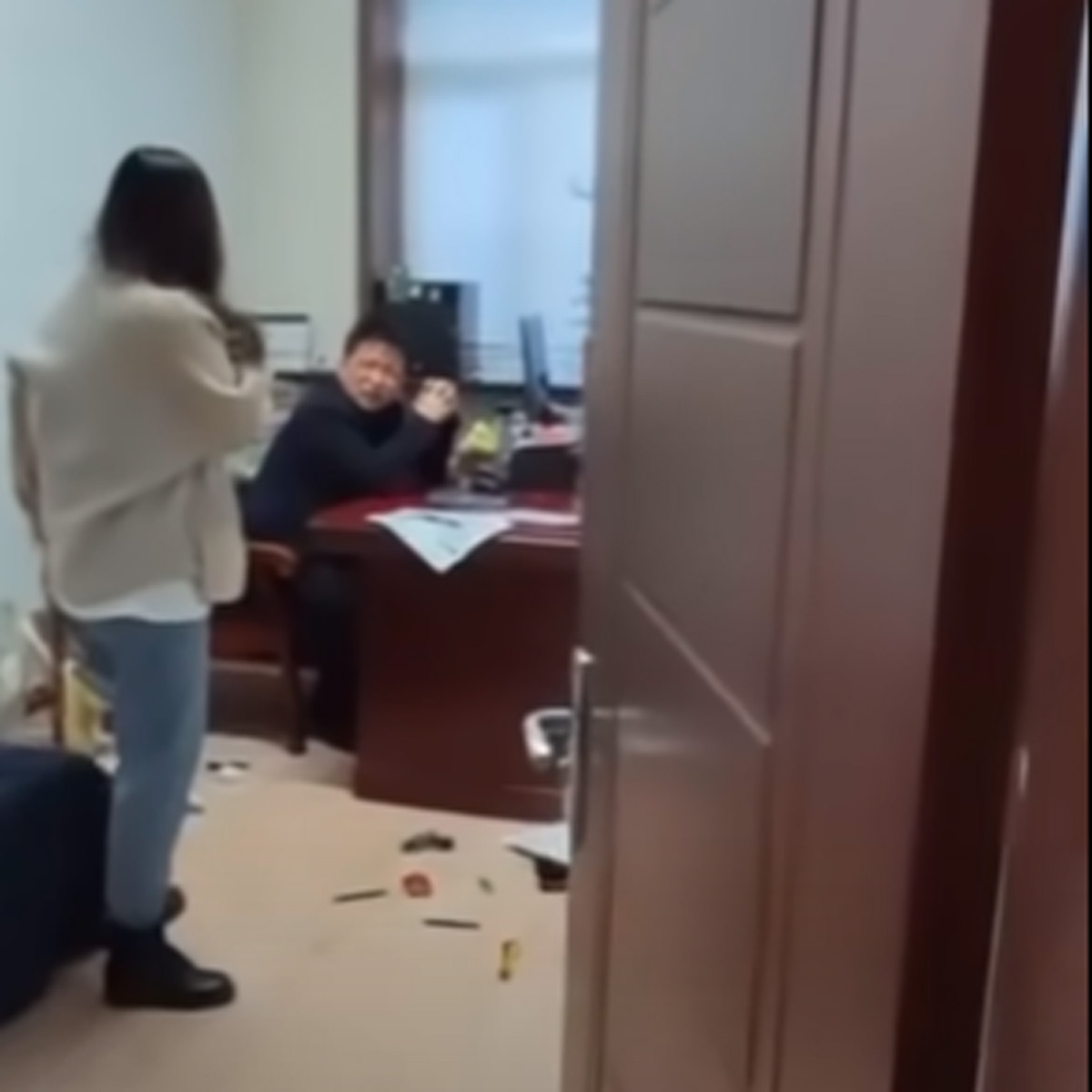 Woman beat boss