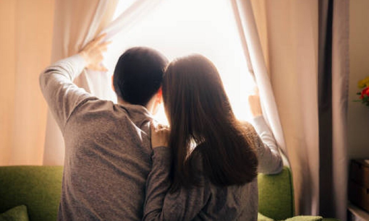 couple infront of school