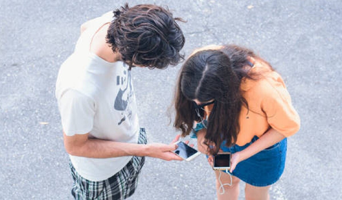 couple infront of school