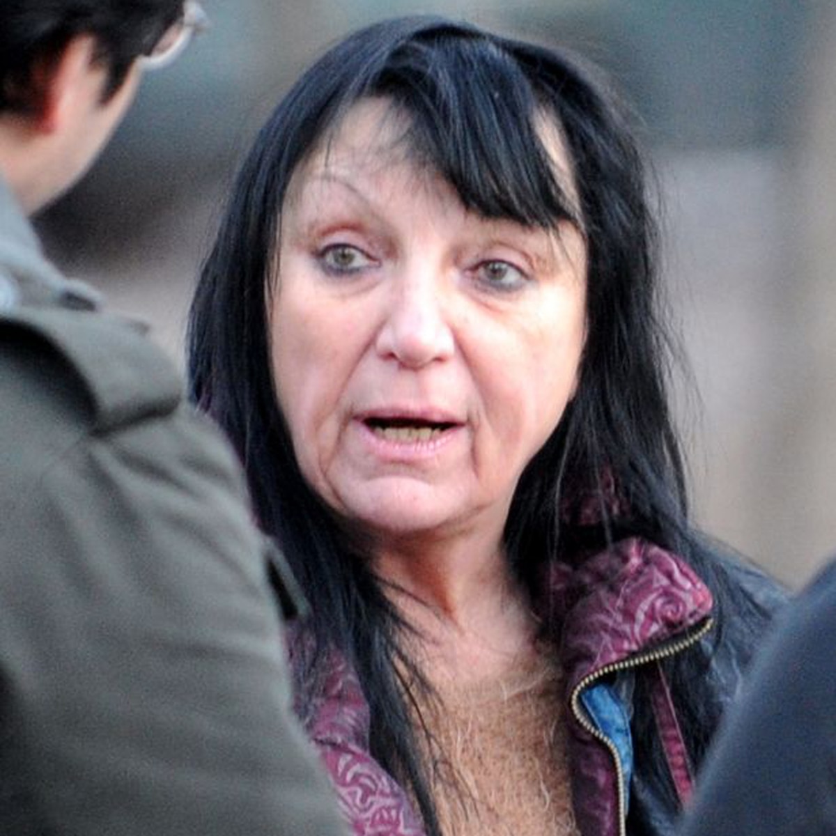 chimpanzee eats woman