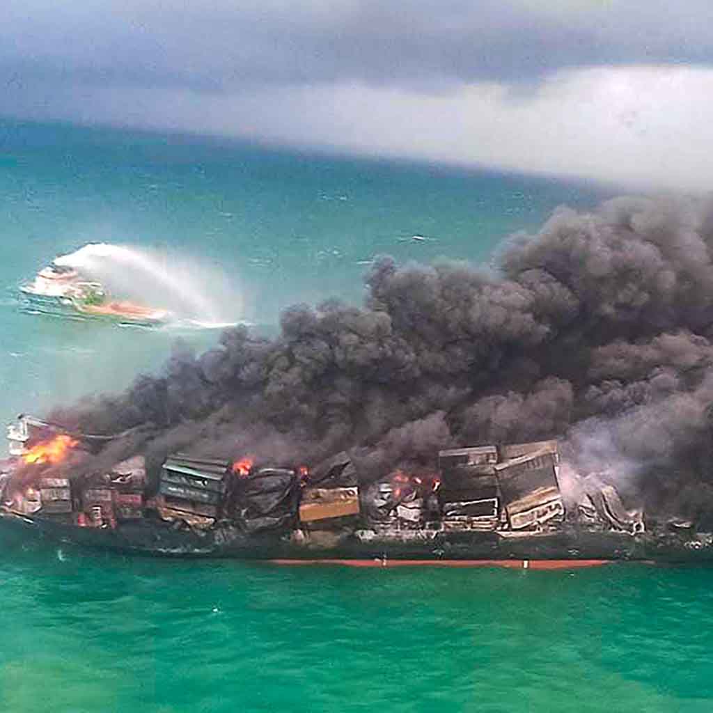 Burning cargo vessel