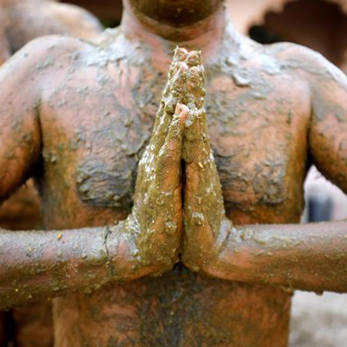 Indians putting cow dung