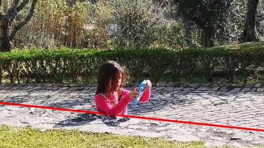 girl sunk in concrete road