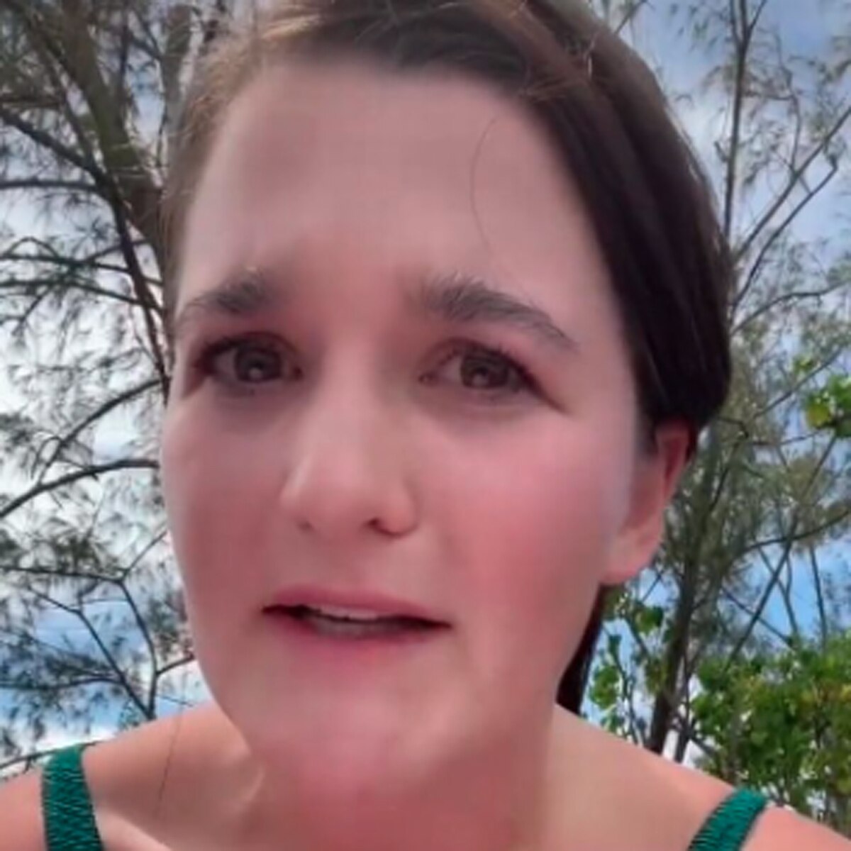 woman taking sunbath on beach