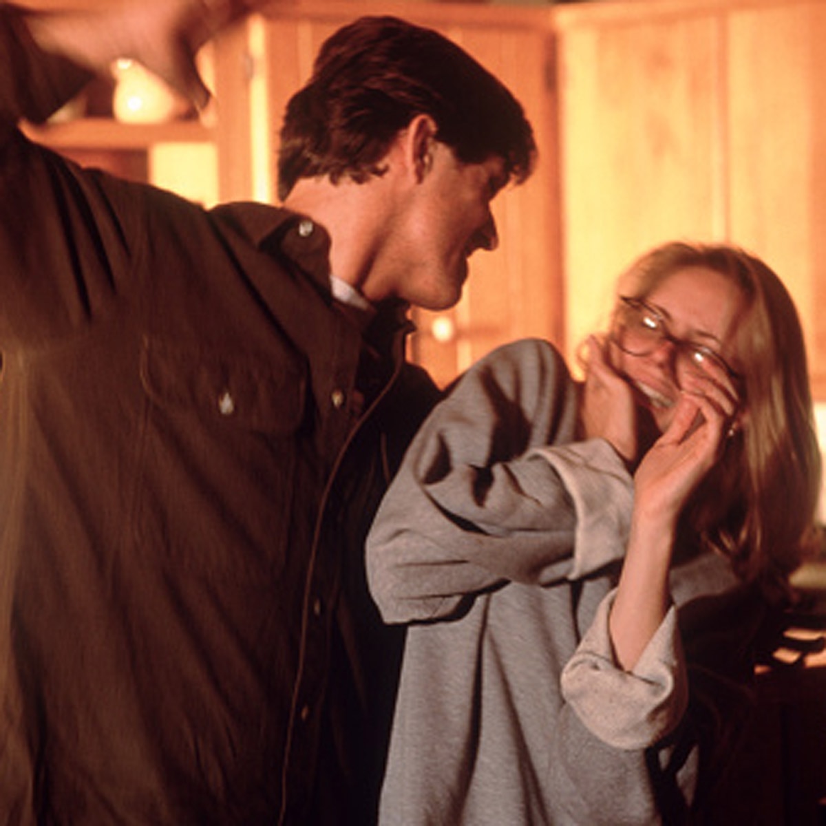 woman jumping from window