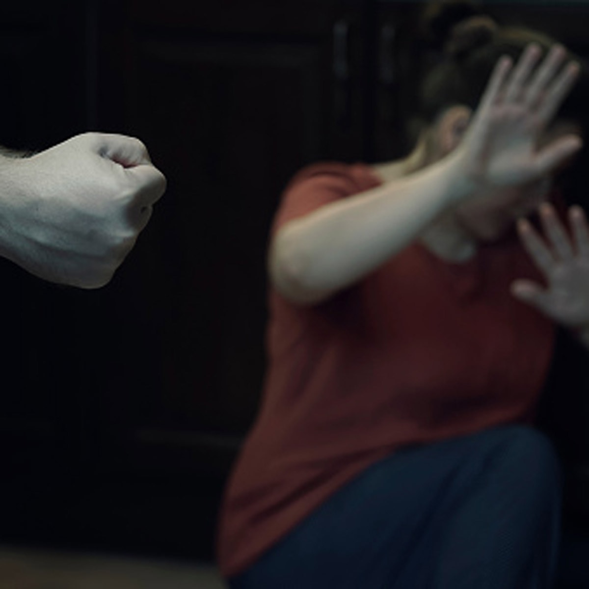 woman jumping from window