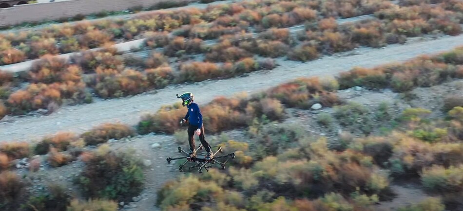 man fly with drone