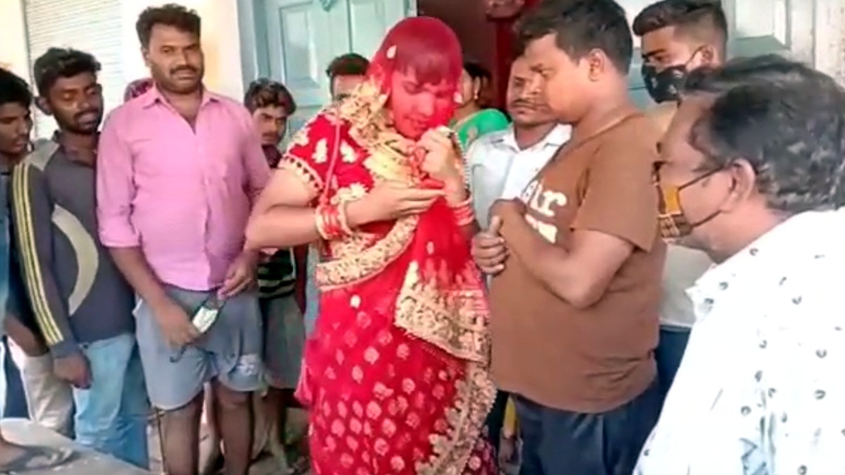 A young man entered the house disguised as a woman