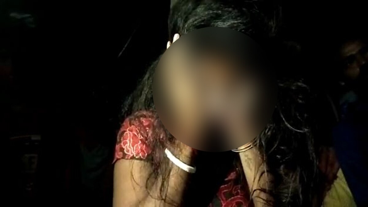 Woman tied to lamp post and beaten up