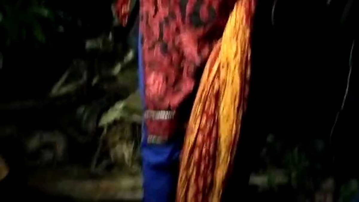 Woman tied to lamp post and beaten up