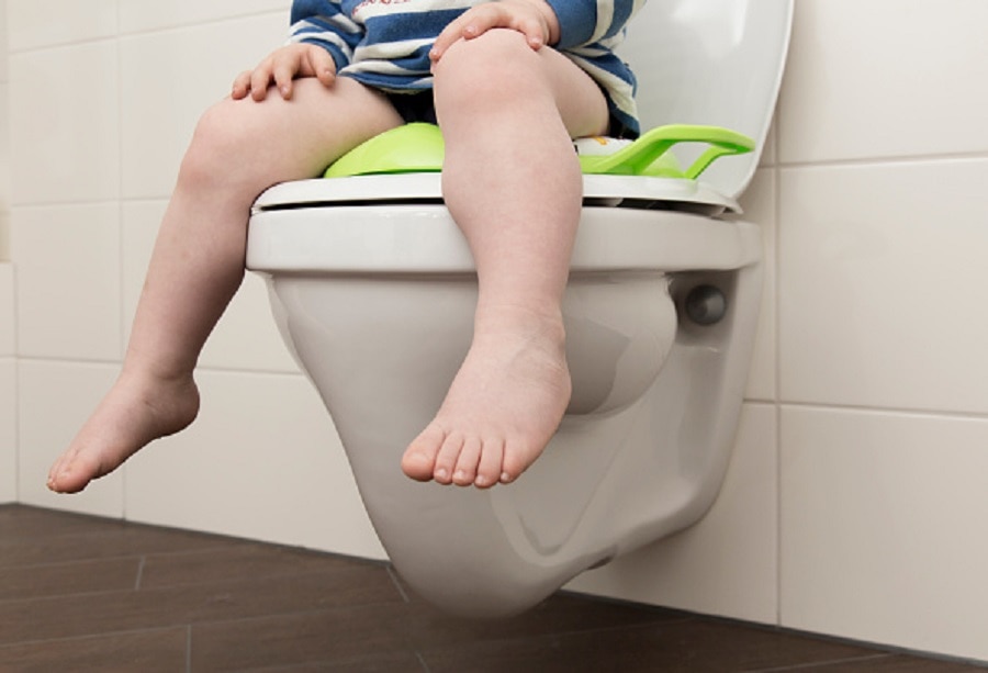girl head stuck in toilet seat