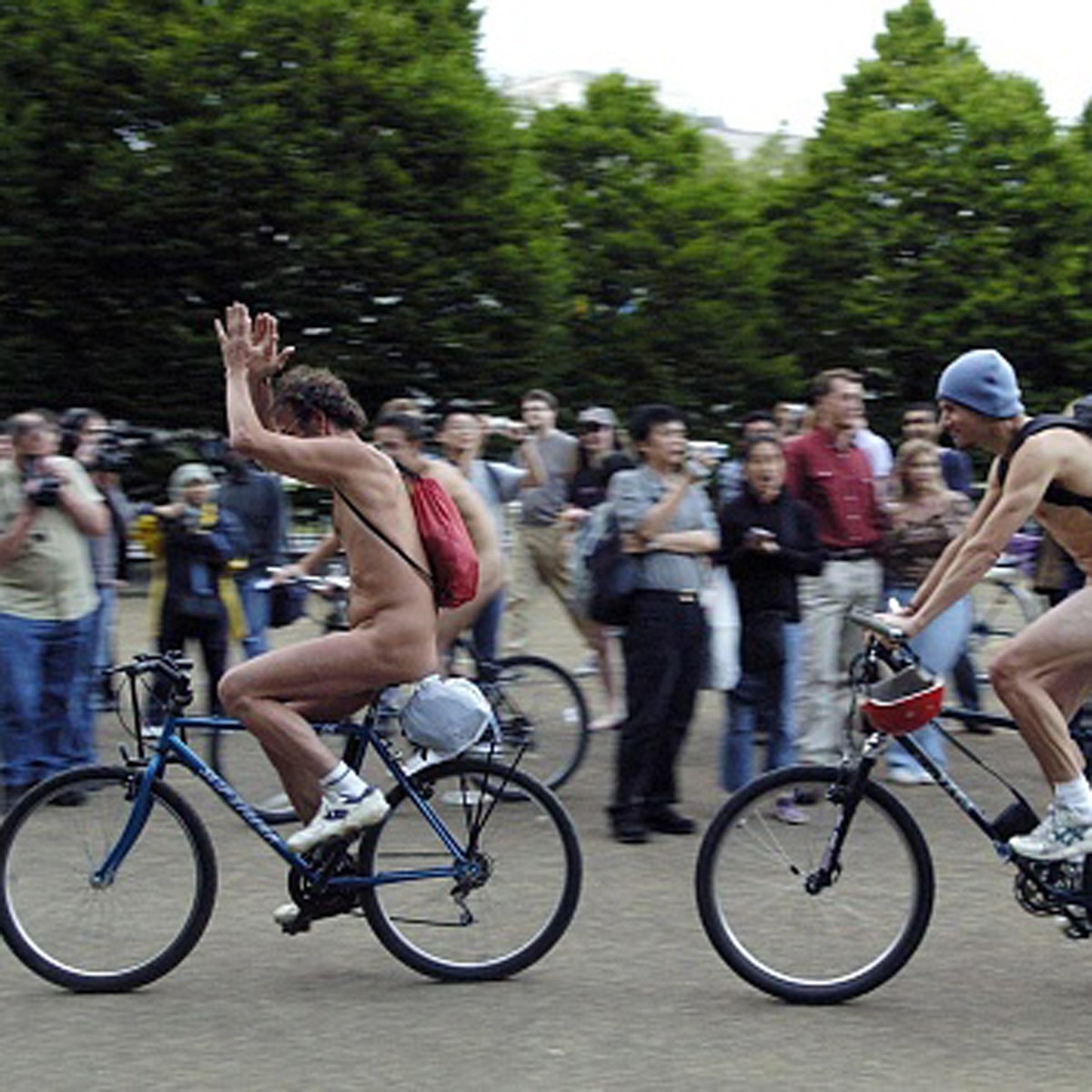 nude protest on bicycle