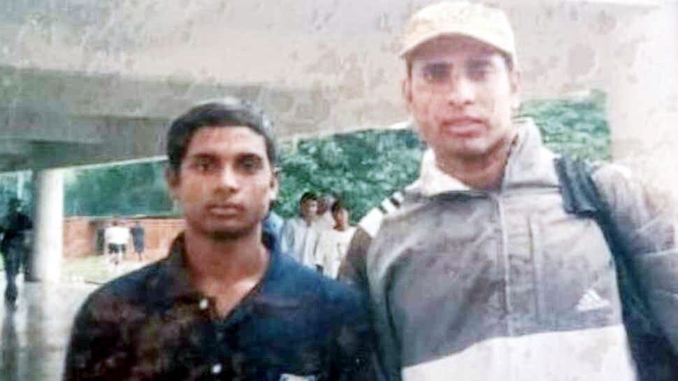 Prakash Bhagat with VVS Laxman.