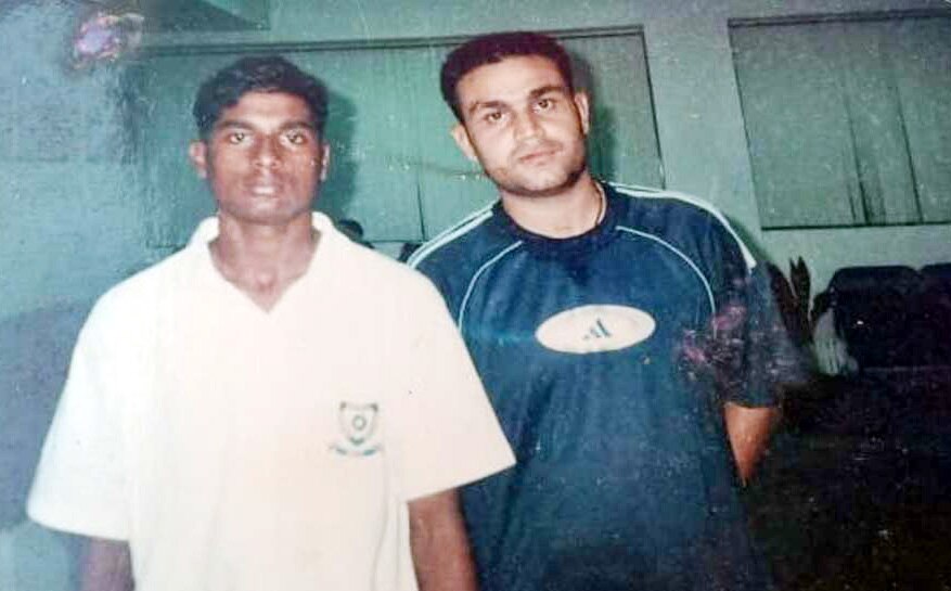 Prakash Bhagat with Virender Sehwag.