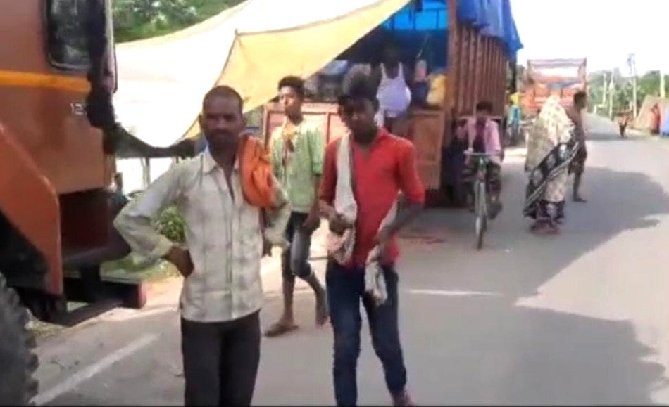 Villagers living in trucks