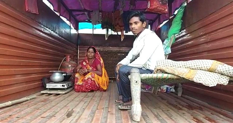 Villagers living in trucks