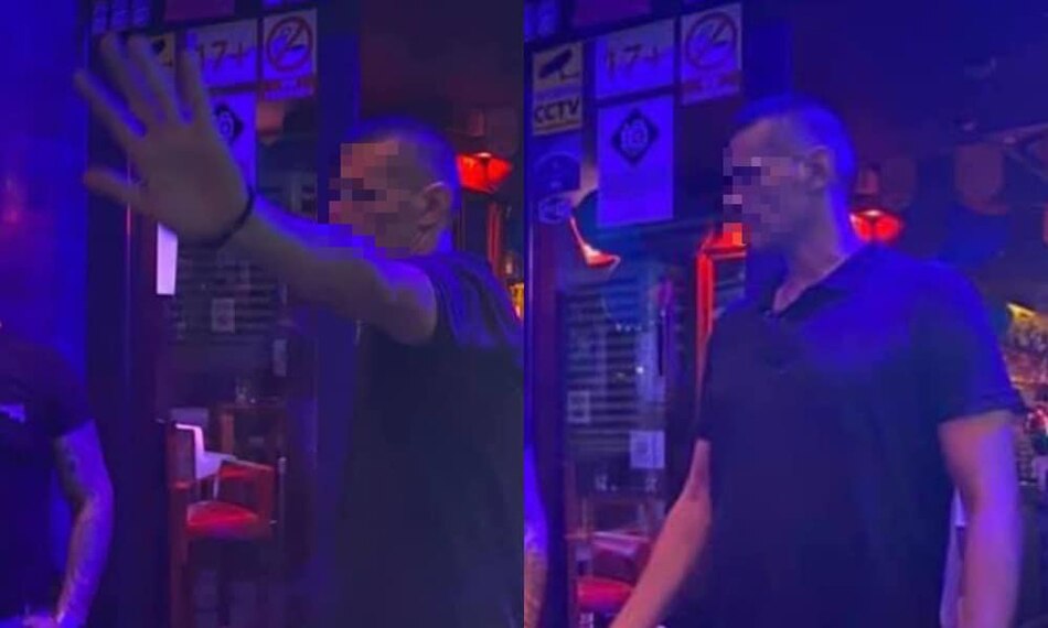 girls kissing in bar