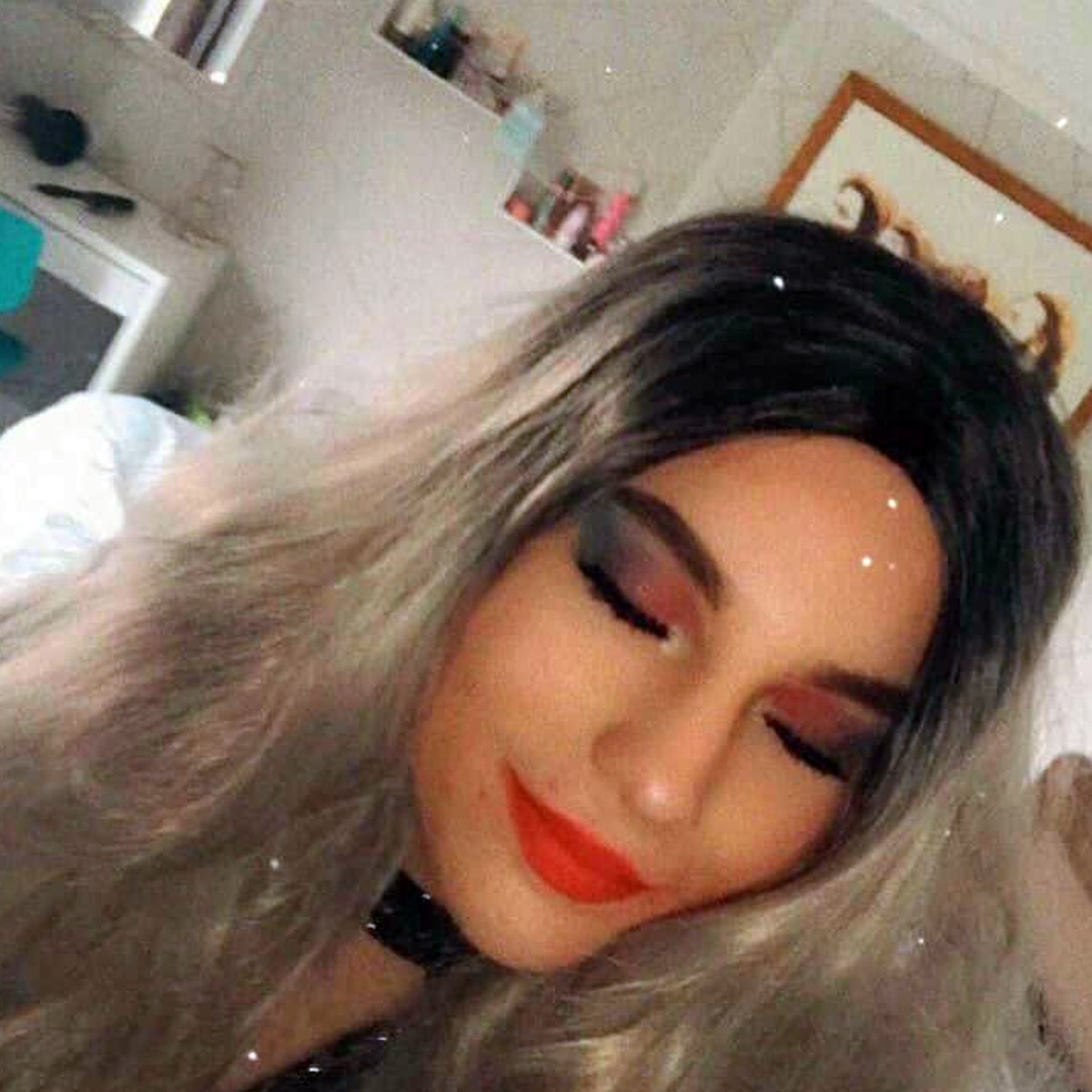 16 year old boy wearing mother clothes