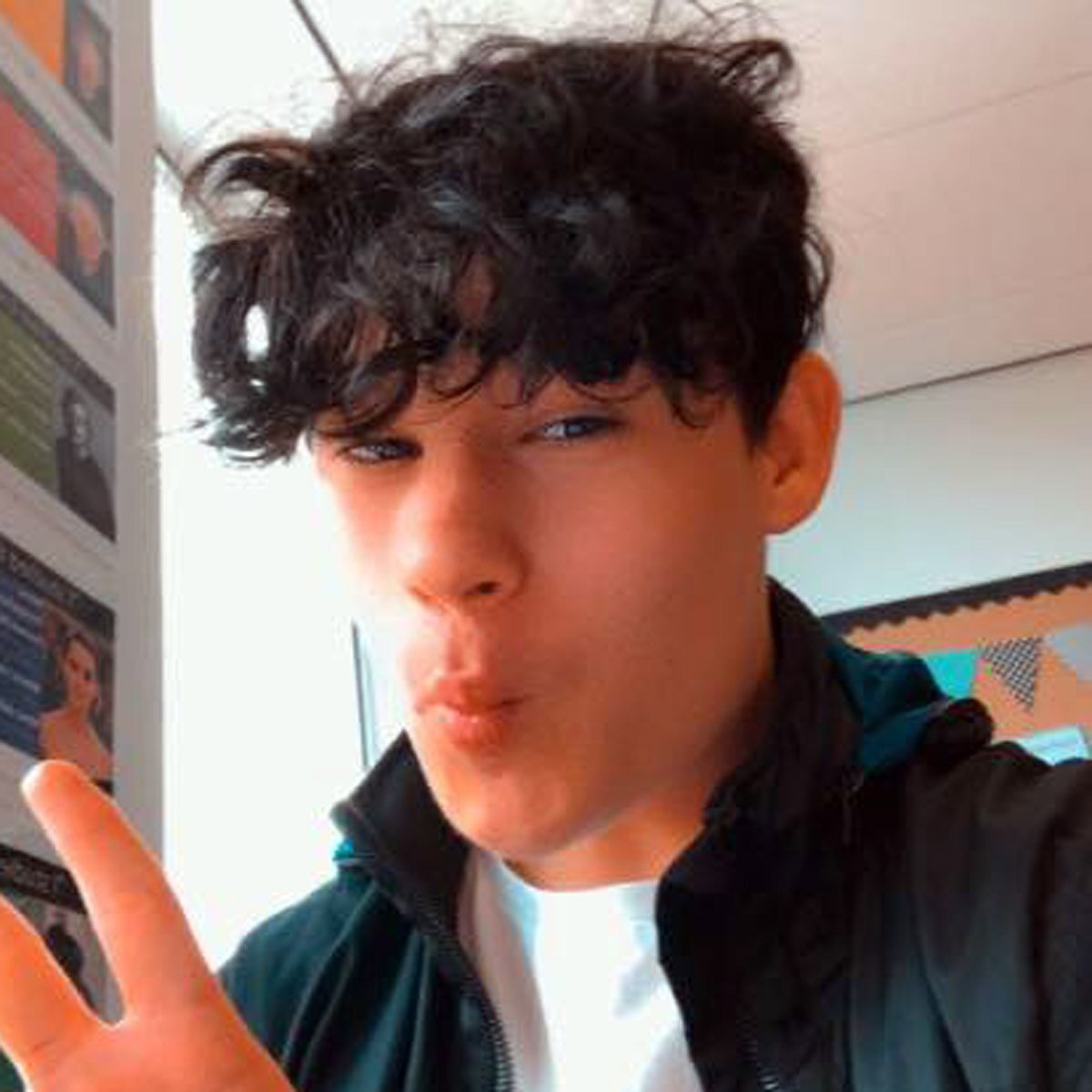 16 year old boy wearing mother clothes