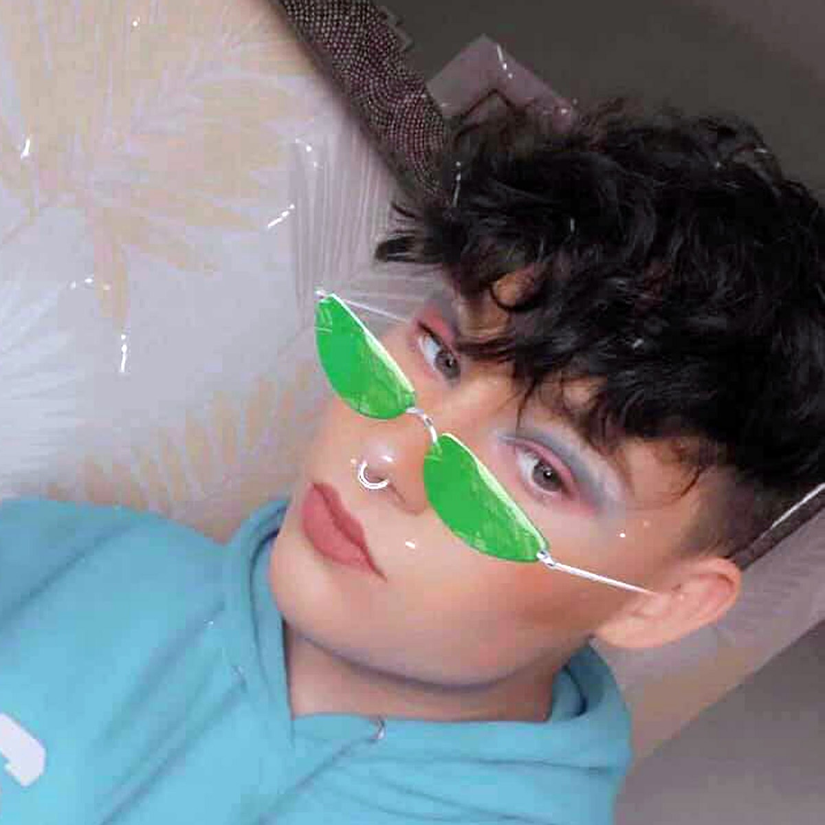 16 year old boy wearing mother clothes