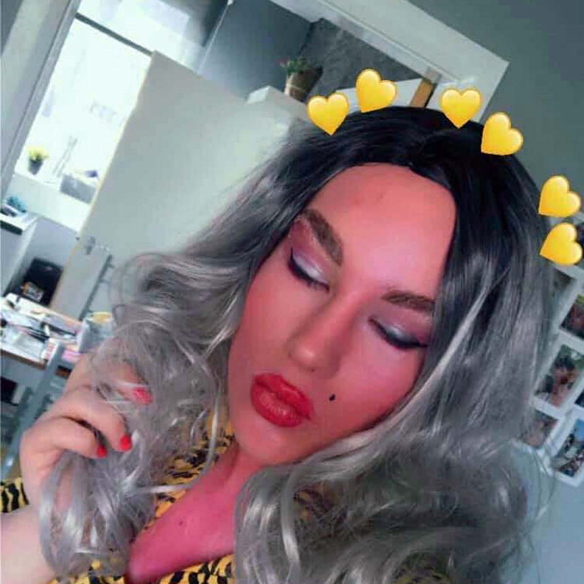 16 year old boy wearing mother clothes