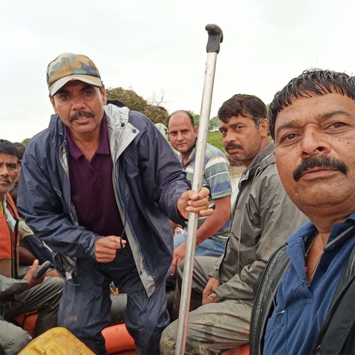 Family sitting on tree for 24 hours