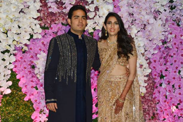Akash Ambani and his Wife. (Getty)