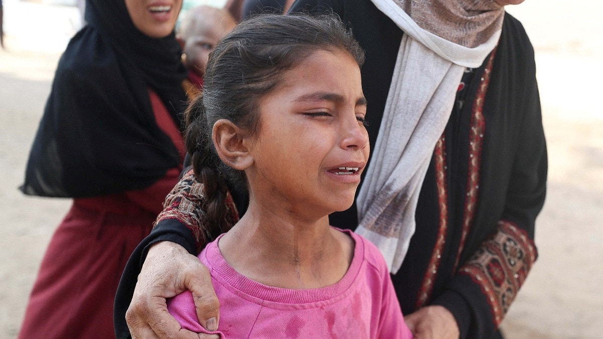 In Pictures -  जंग के बीच फंसे देशों मे जीवन के लिए जूझती मासूम जिंदगियां