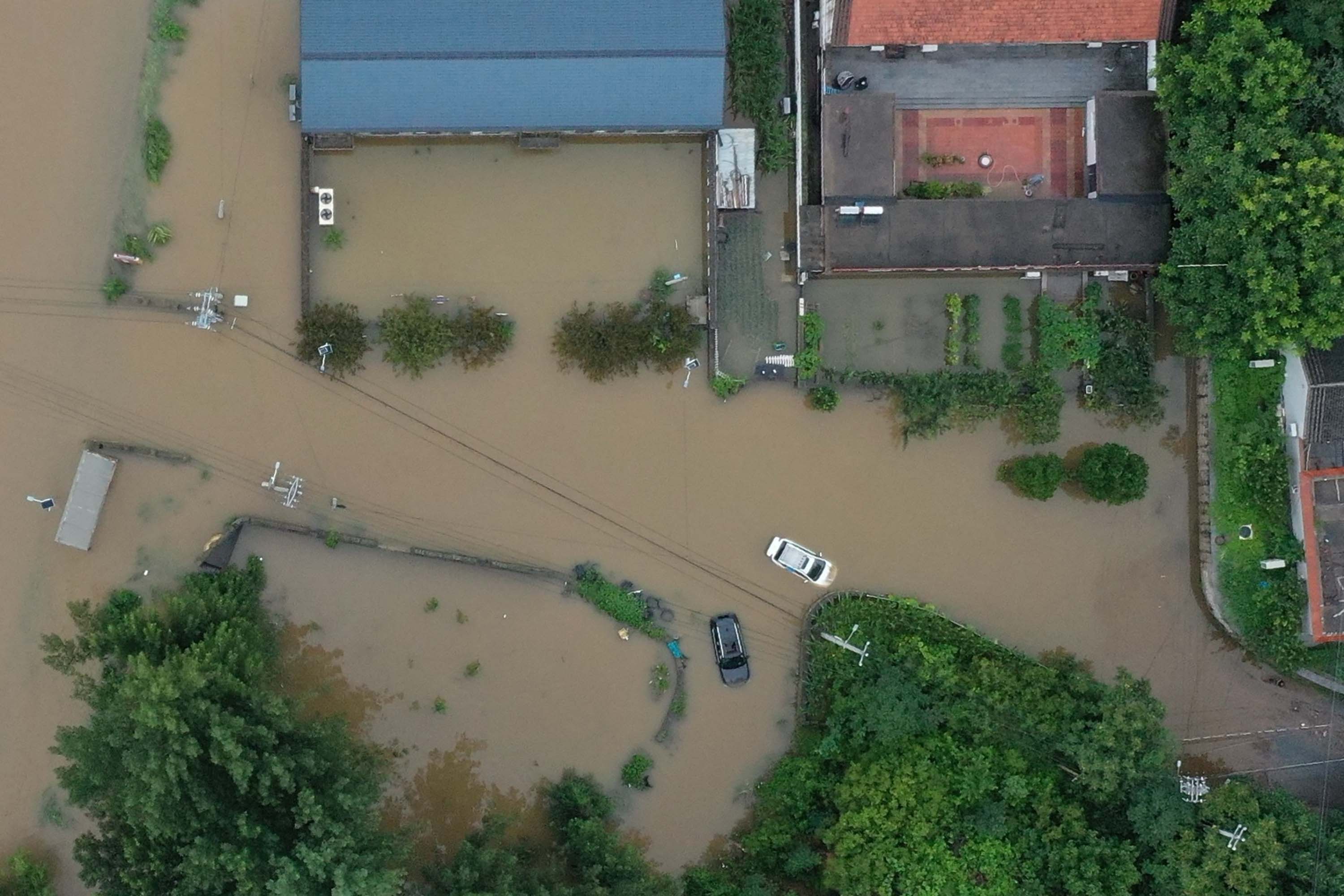 china rain flood devastation