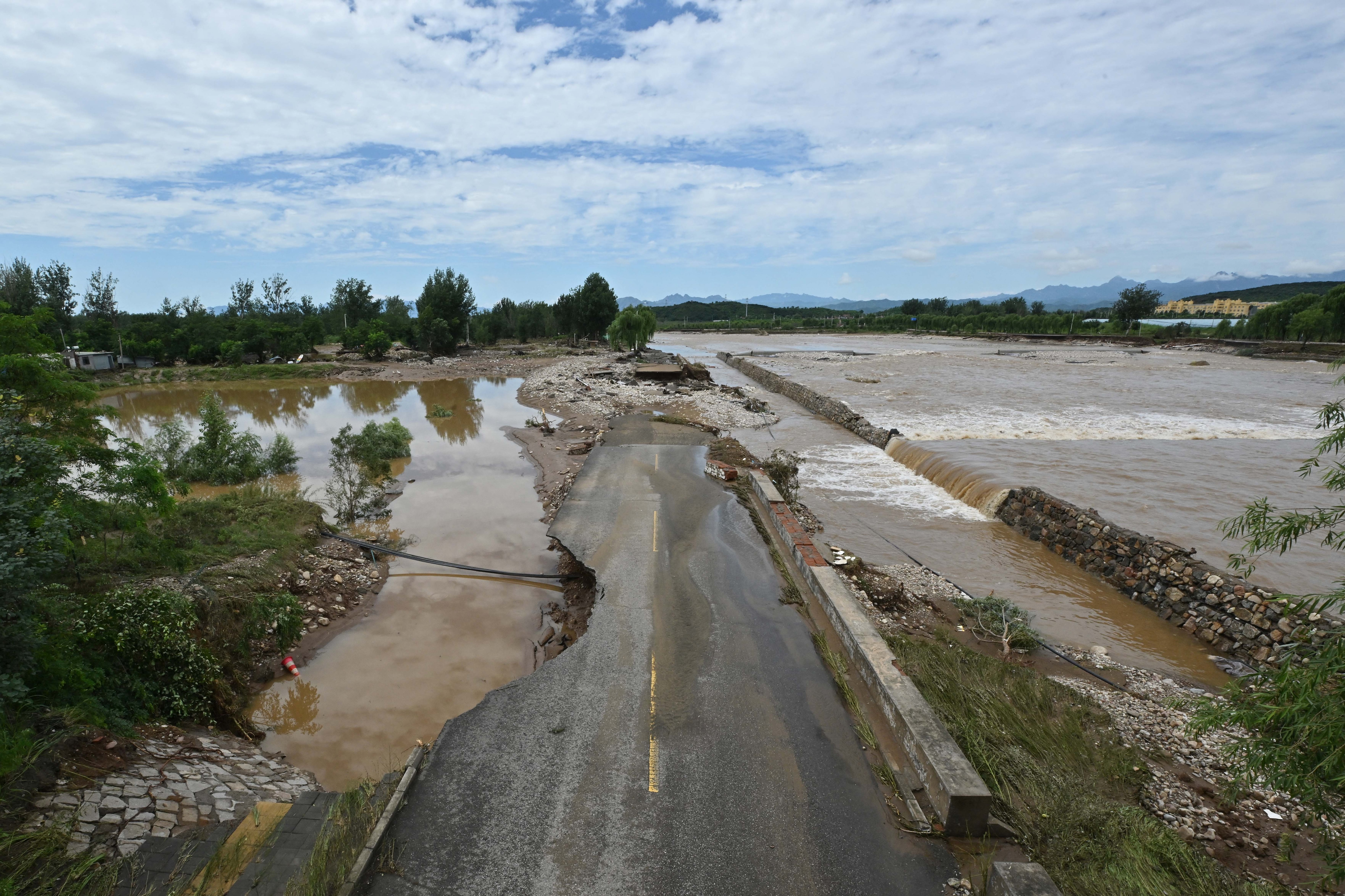 china rain flood devastation