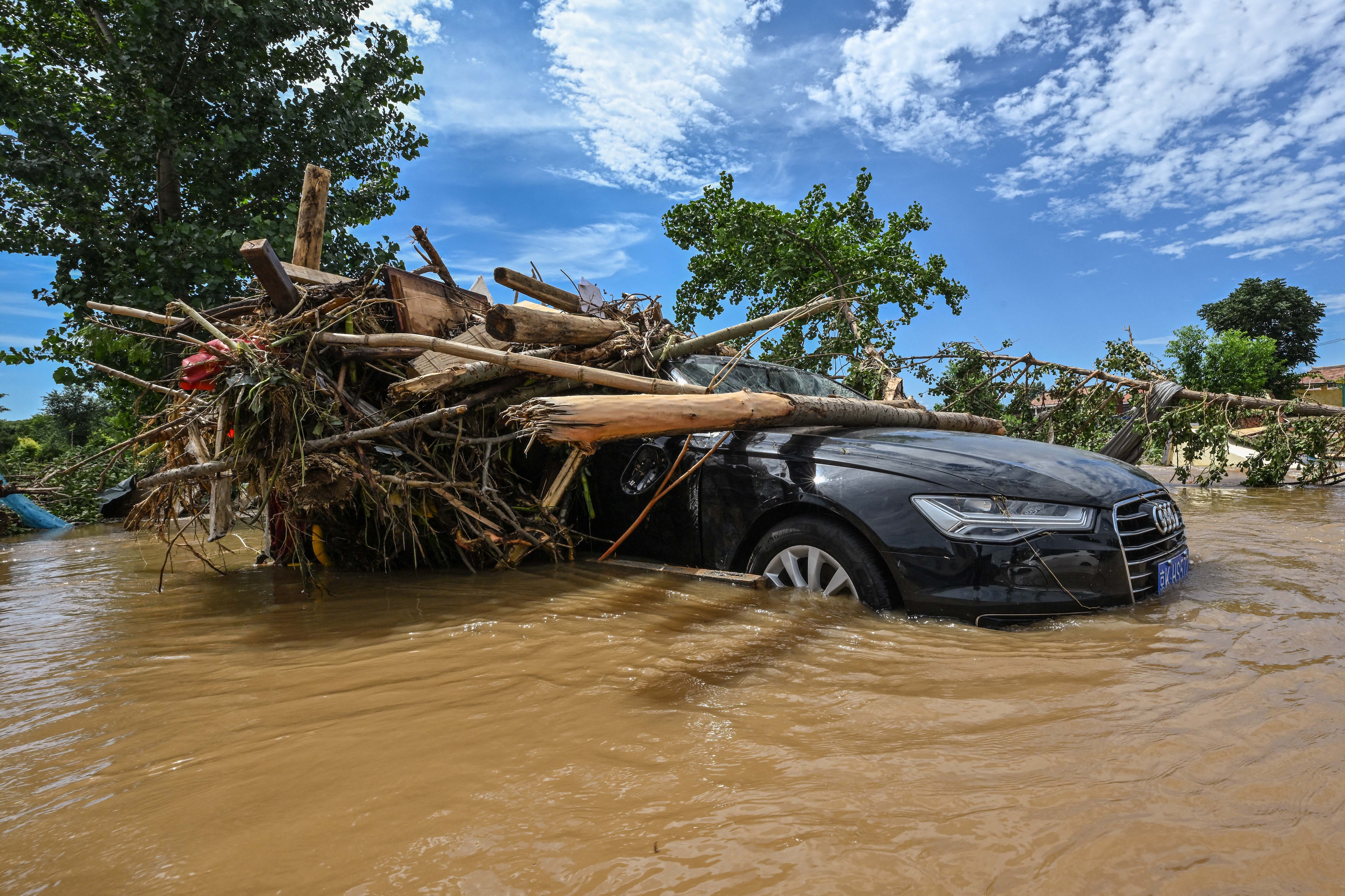china rain flood devastation