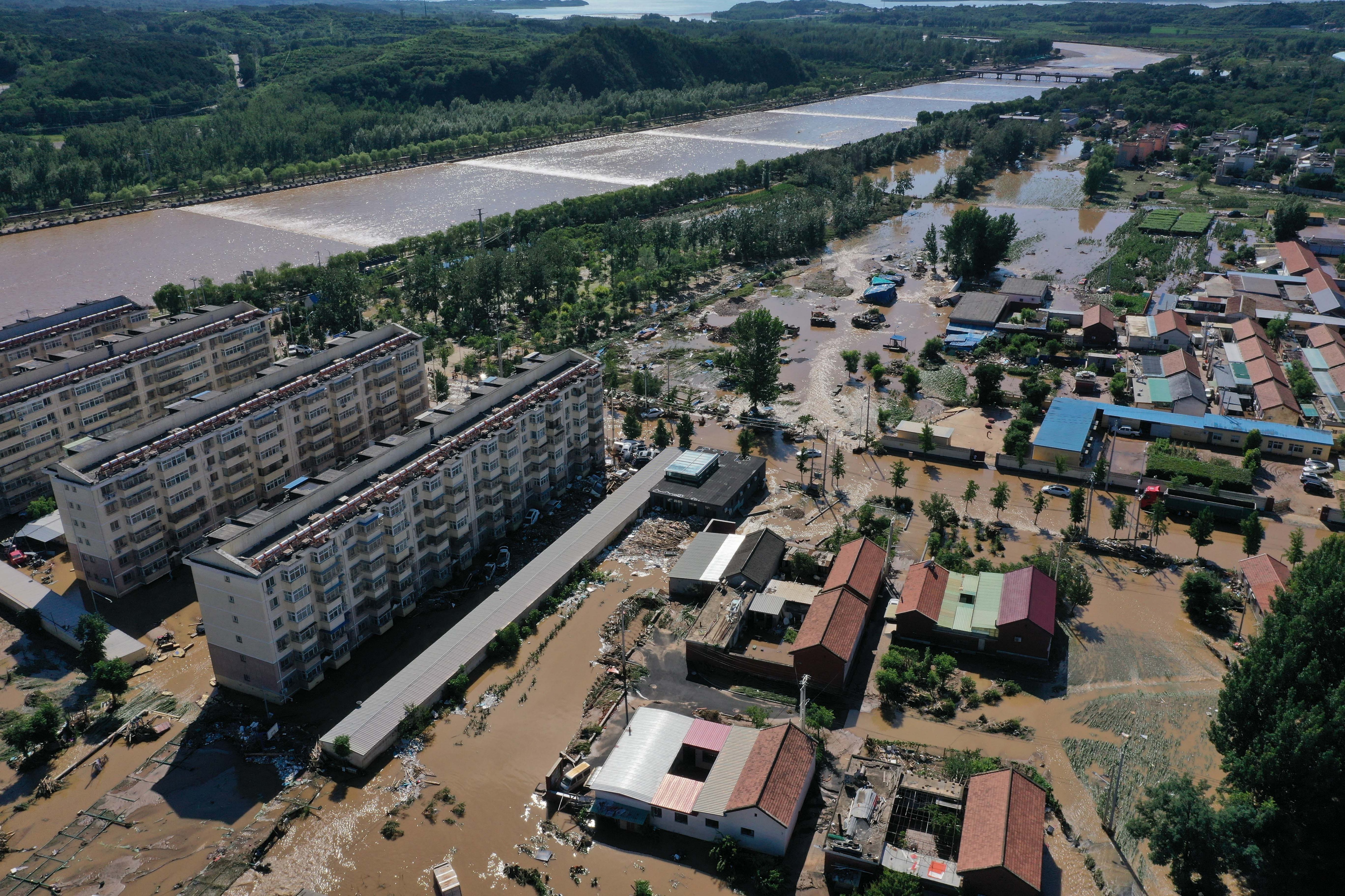 china rain flood devastation