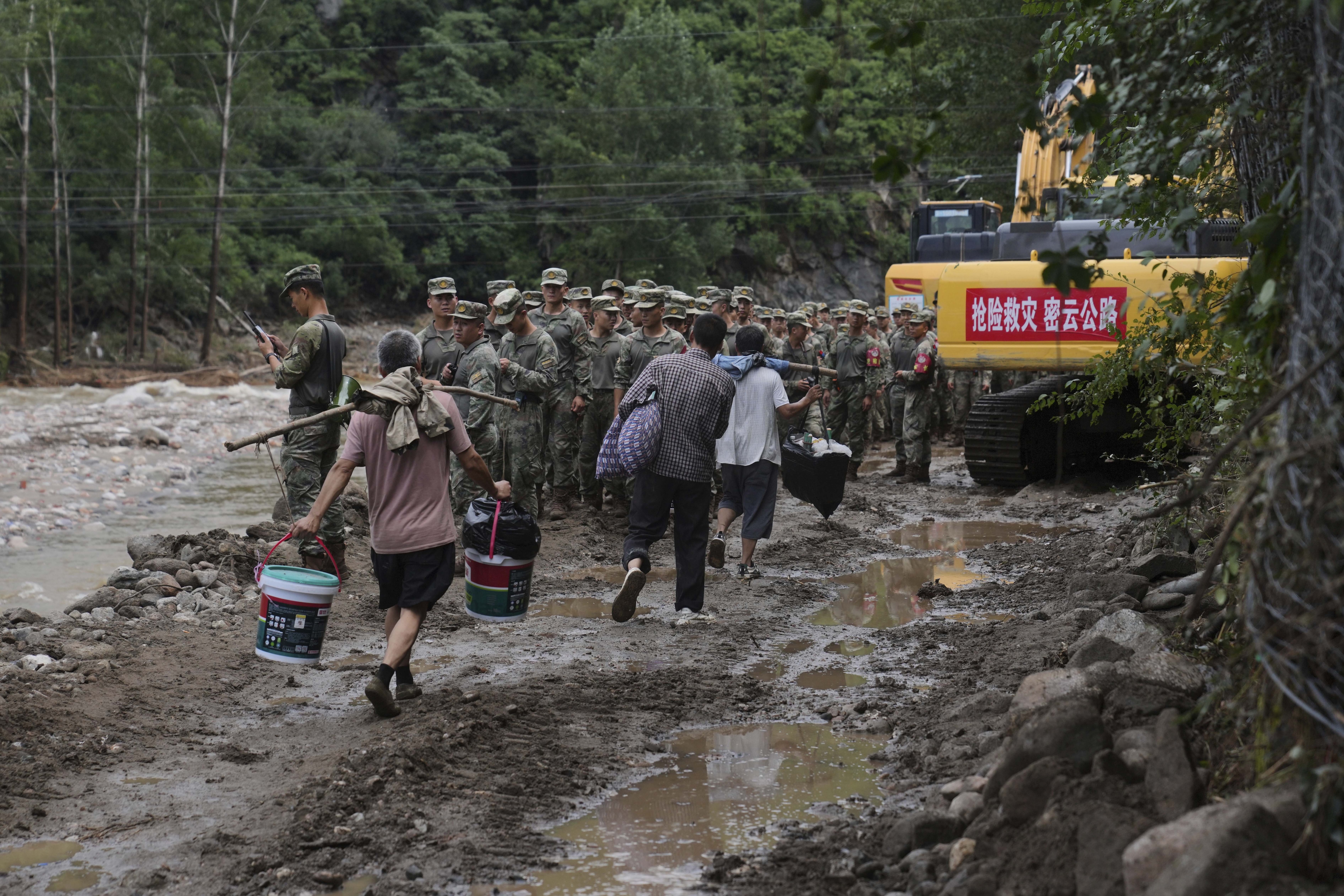 china rain flood devastation