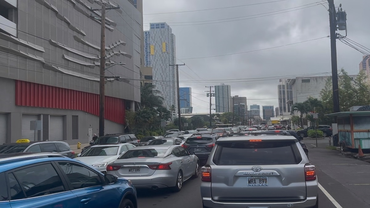 A traffic jam forms in Honolulu as people heed a tsunami evacuation warning (AP Photo)