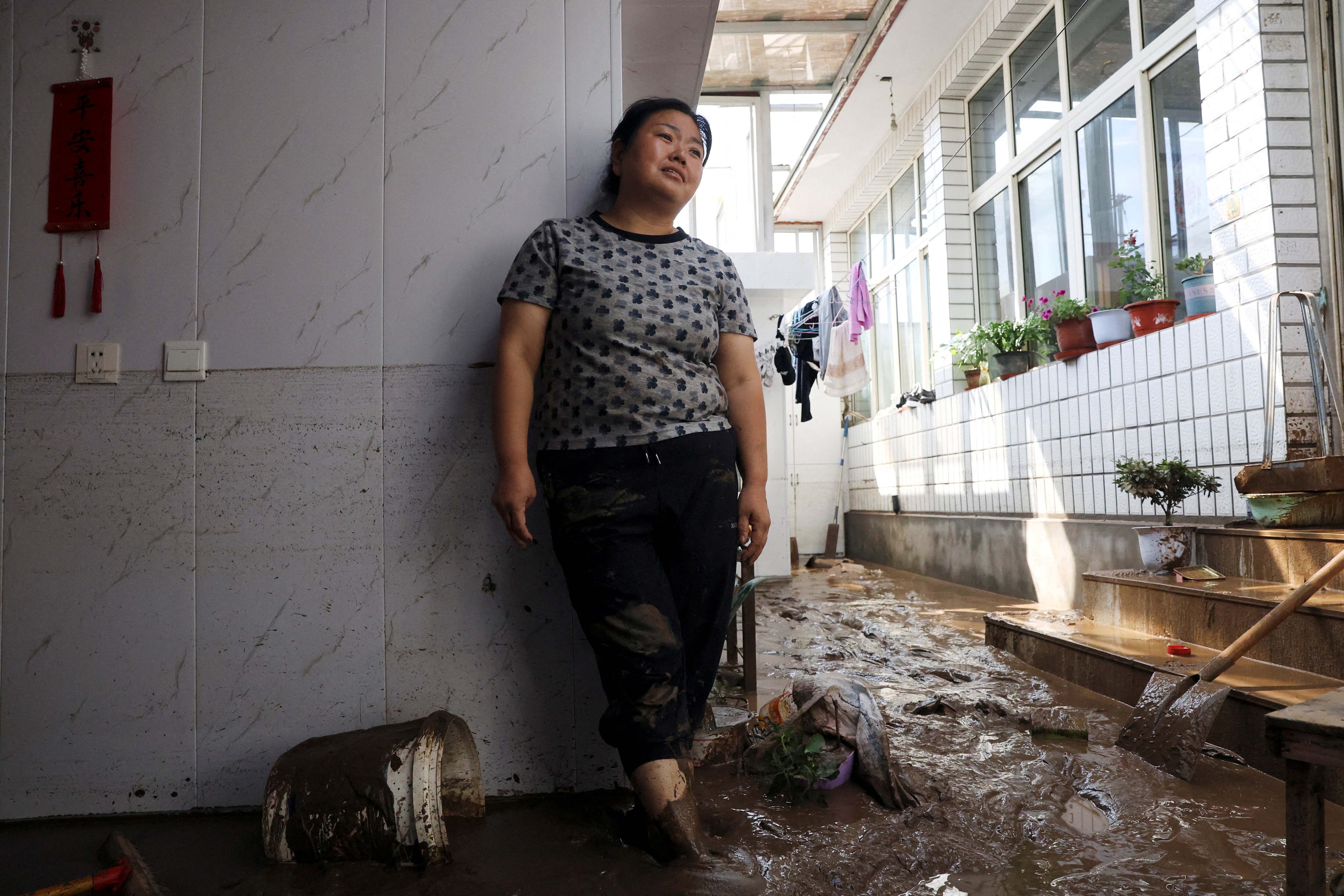 china rain flood devastation