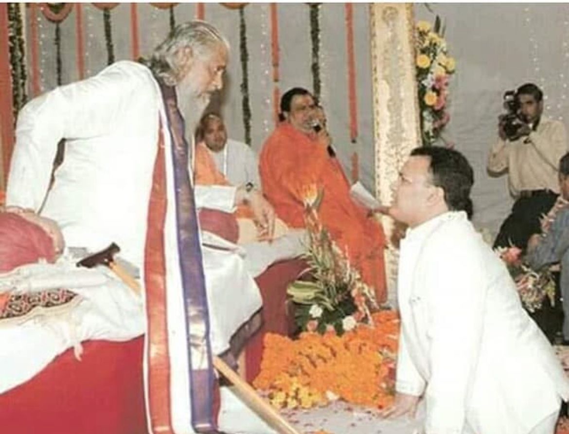 man blessing other man