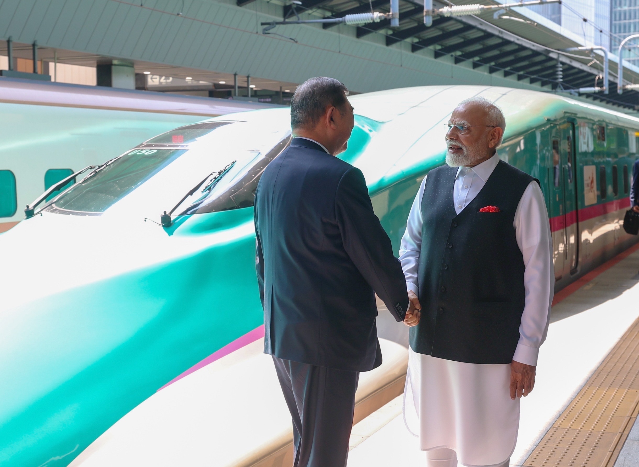 PM Modi with Japanese PM Shigeru Ishiba near bullet train