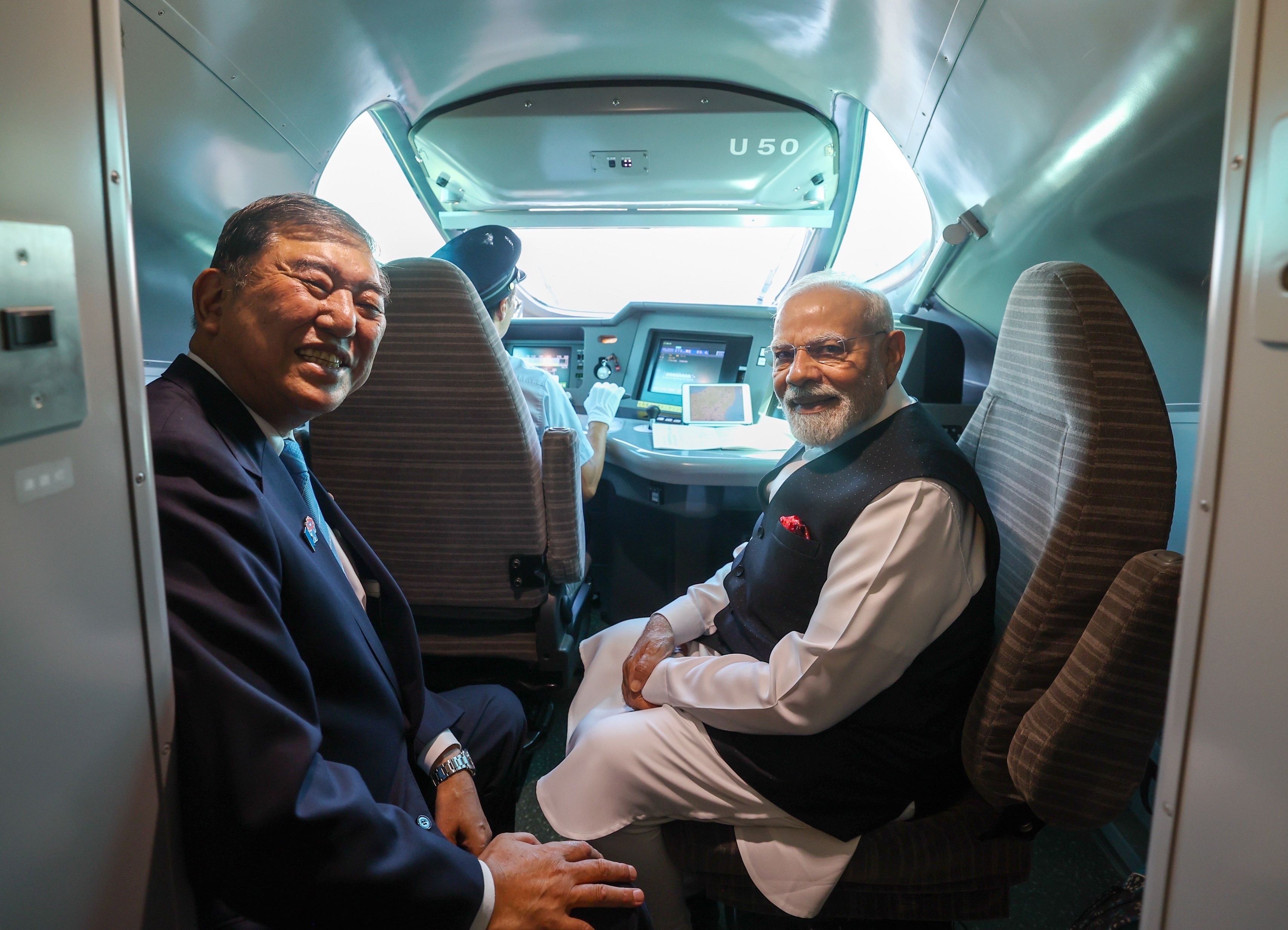 PM Modi with Japanese PM Shigeru Ishiba in bullet train