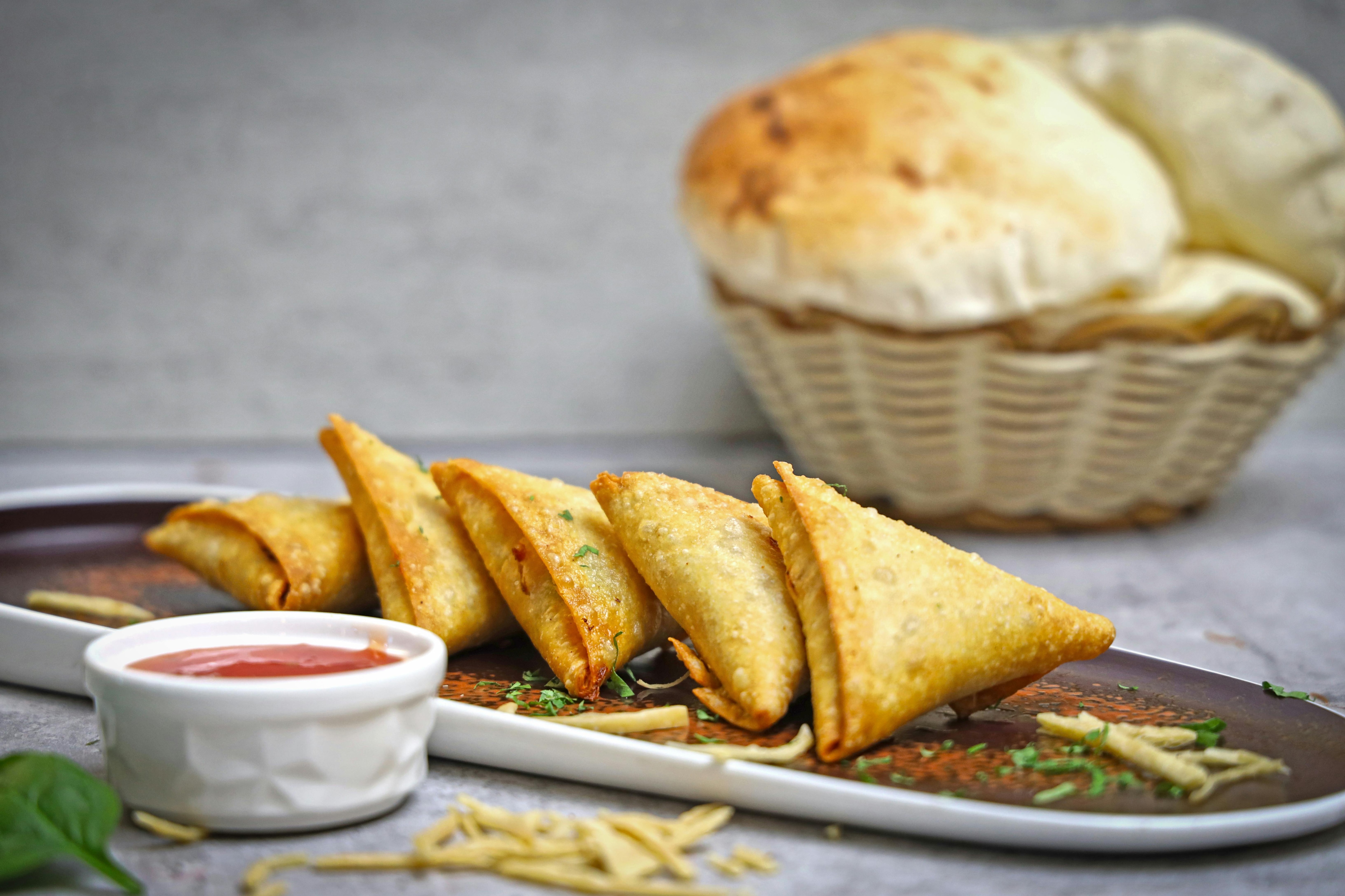 samosa and chutney in plate