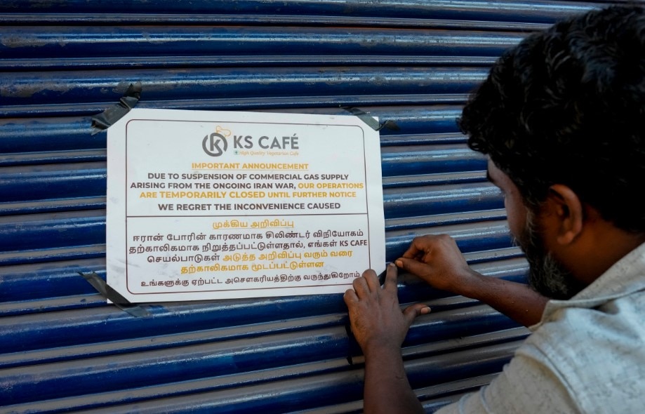 A notice pasted on the shutter of a restaurant due to shortage of LPG gas cylinders, in Chennai (PTI Photo)